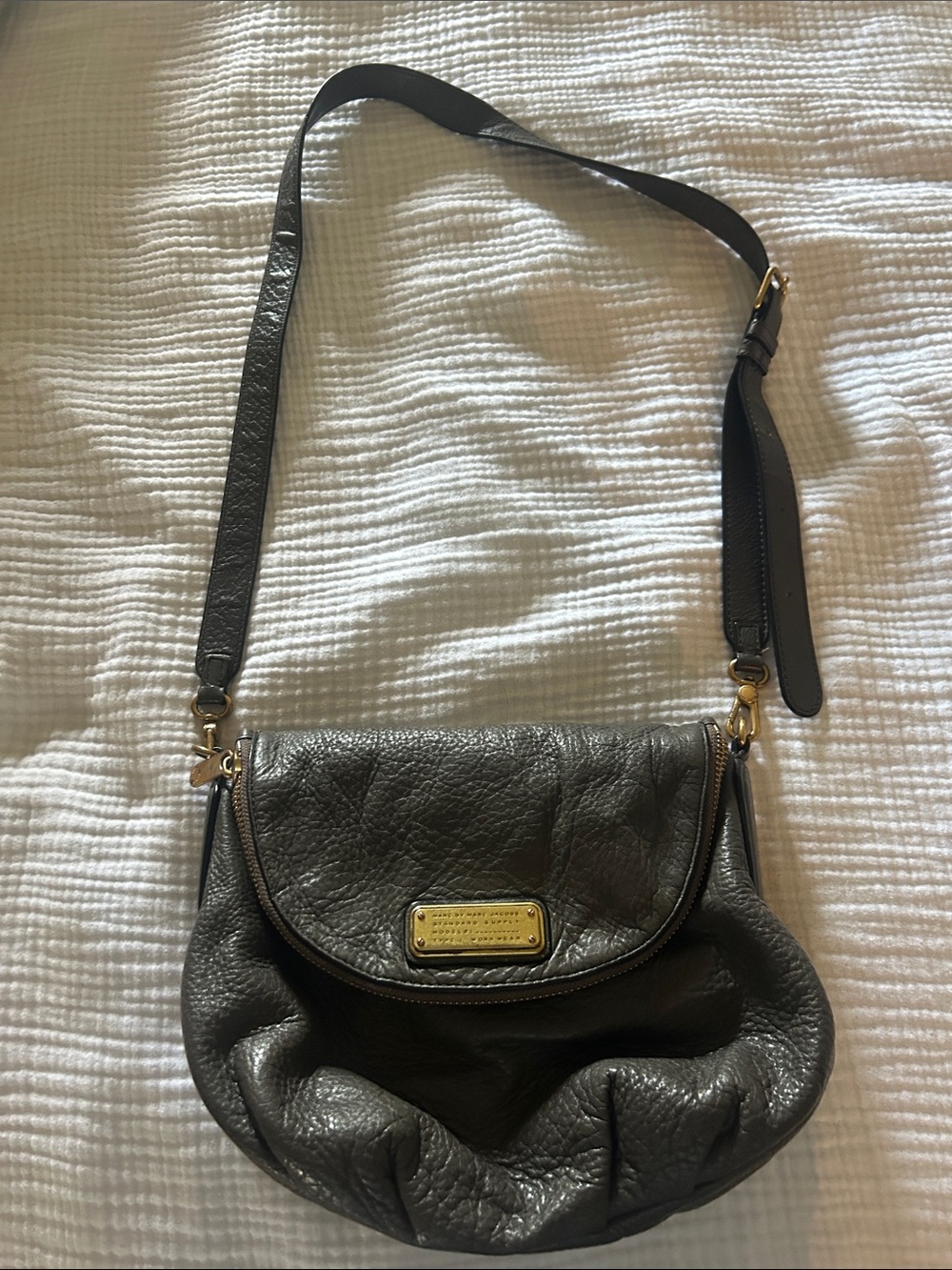 Pebbled Black Leather Crossbody Bag with Gold Plaque